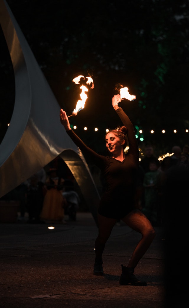 a dancing gypsy at night